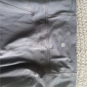 Athleta grey leggings with zipper pockets size small, boot cut